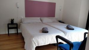 Posteľ alebo postele v izbe v ubytovaní Apartamento Centro Santa Catalina 1ºA