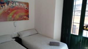 Posteľ alebo postele v izbe v ubytovaní Apartamento Centro Santa Catalina 1ºA