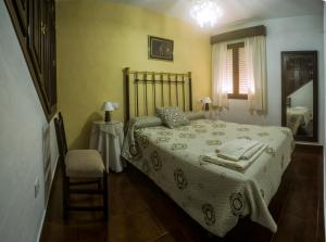 En eller flere senger på et rom på Casa Rural la callejita