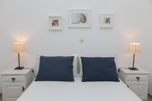 Ένα ή περισσότερα κρεβάτια σε δωμάτιο στο Lykomides