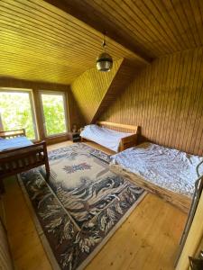 Postel nebo postele na pokoji v ubytování Camping Nad Karpatamy SPA + 37 fotografií