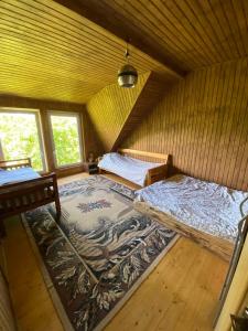 Postel nebo postele na pokoji v ubytování Camping Nad Karpatamy SPA