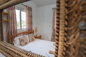 Postel nebo postele na pokoji v ubytování Sun & Sand Private Villa + 72 fotografií