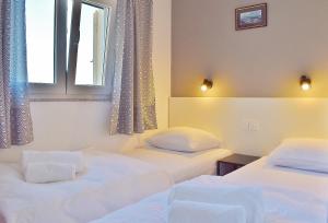 Postel nebo postele na pokoji v ubytování Penthouses Panorama