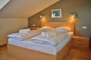 Postel nebo postele na pokoji v ubytování Penthouses Panorama
