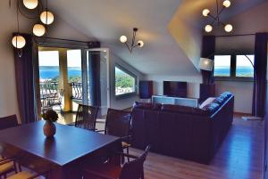 Posezení v ubytování Penthouses Panorama