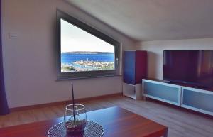 TV a/nebo společenská místnost v ubytování Penthouses Panorama