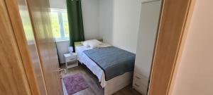 Postel nebo postele na pokoji v ubytování Villa Aninka