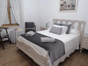 Katil atau katil-katil dalam bilik di Casa Rural Casa La Abuela