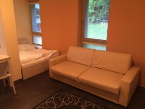 Postel nebo postele na pokoji v ubytování Apartman Harrachov