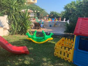 a group of childrens play equipment in a backyard at Matej in Budva