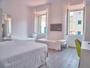 Кровать или кровати в номере Hotel Medusa