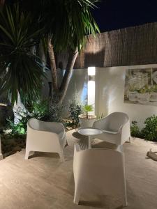 A seating area at Casa Holandaluzas Marbella near Beach, with salt water Pool and private parking