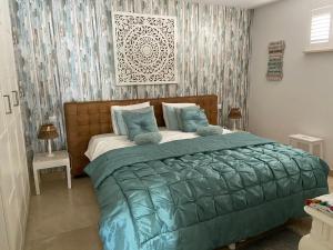 A bed or beds in a room at Casa Holandaluzas Marbella near Beach, with salt water Pool and private parking