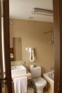 Koupelna v ubytování Hotel Zenite