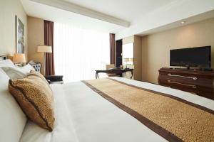 Televiisor ja/või meelelahutuskeskus majutusasutuses Eastin Grand Hotel Saigon
