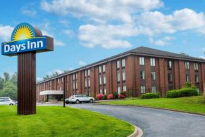 a days inn sign in front of a building at Days Inn by Wyndham Westminster in Westminster