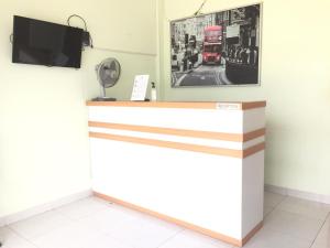 TV a/nebo společenská místnost v ubytování Hotel The Village Syariah