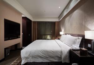 Katil atau katil-katil dalam bilik di The Tango Hotel Taipei XinYi