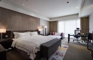 Katil atau katil-katil dalam bilik di The Tango Hotel Taipei XinYi