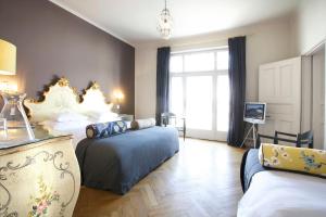 Posteľ alebo postele v izbe v ubytovaní Das REGINA Boutiquehotel