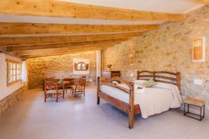 Ein Bett oder Betten in einem Zimmer der Unterkunft Finca Can Blai