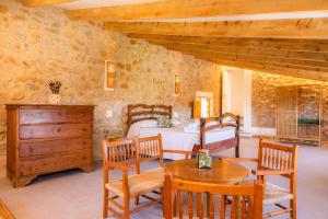 Ein Bett oder Betten in einem Zimmer der Unterkunft Finca Can Blai