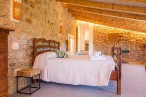 Ein Bett oder Betten in einem Zimmer der Unterkunft Finca Can Blai