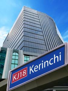 a kbs kennett sign in front of a building at Suites at Imperial Bangsar by Plush in Kuala Lumpur