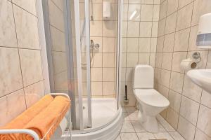 Koupelna v ubytování Daily Apartments - Tatari street