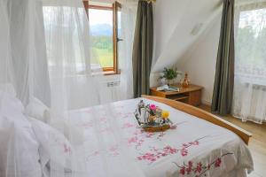Posteľ alebo postele v izbe v ubytovaní Apartament Na Wierchu