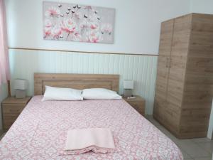 Postel nebo postele na pokoji v ubytování Zefi's apartment sea room