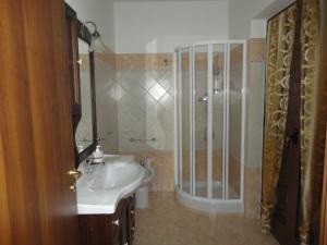 a bathroom with a shower and a sink at Green House in Morano Calabro +20 photos