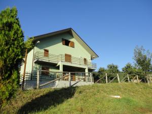 a house on the side of a hill at Green House in Morano Calabro