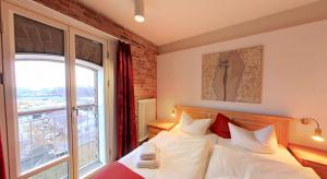 Postel nebo postele na pokoji v ubytování Speicher Barth - Superior-Hotel