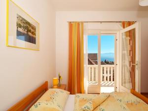 Ένα ή περισσότερα κρεβάτια σε δωμάτιο στο Apartments NewWay Bol