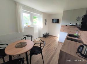 Kuchyň nebo kuchyňský kout v ubytování Apartmán Lenka II