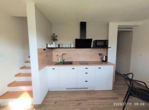 Kuchyň nebo kuchyňský kout v ubytování Apartmán Lenka II + 7 fotografií