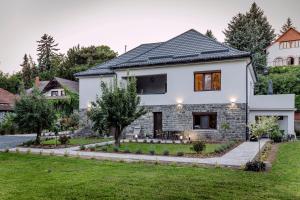 Vonkajšia záhrada v ubytovaní Nádas Center Home Badacsony