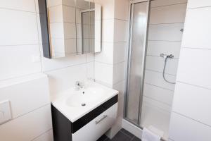 Łazienka w obiekcie Appartement Graz - Ihr erstklassiges Zuhause fernab von Zuhause