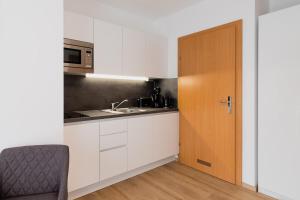 Kuchnia lub aneks kuchenny w obiekcie Appartement Graz - Ihr erstklassiges Zuhause fernab von Zuhause