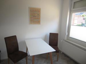 Posezení v ubytování Ferienhaus Middenin