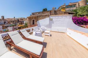 Ein Balkon oder eine Terrasse in der Unterkunft Can Binitu