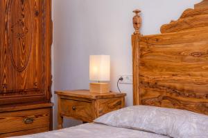 Ein Bett oder Betten in einem Zimmer der Unterkunft Can Binitu