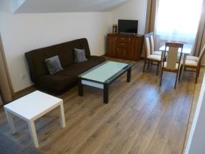 SławęcinにあるKlimatyczny Domek - Apartamenty & Noclegiのギャラリーの写真