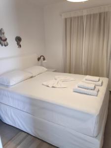 Postel nebo postele na pokoji v ubytování Aletri & Orgoma