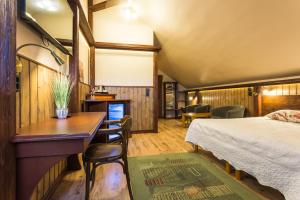 Postel nebo postele na pokoji v ubytování Ruunawere Hotel