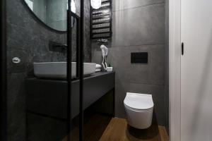 Kúpeľňa v ubytovaní Homewell Boutique Apartments Stare Miasto
