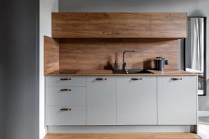 Kuchyňa alebo kuchynka v ubytovaní Homewell Boutique Apartments Stare Miasto