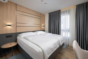 Posteľ alebo postele v izbe v ubytovaní Sun Spalato Villas
